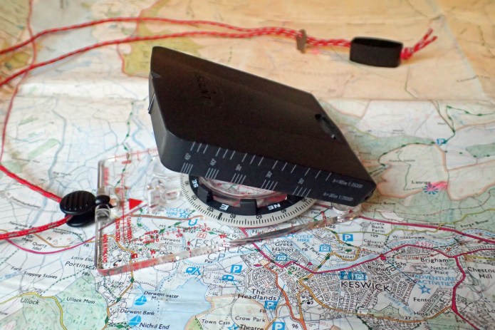 Slope scales on side of mirror housing on Suunto MC-2G compass