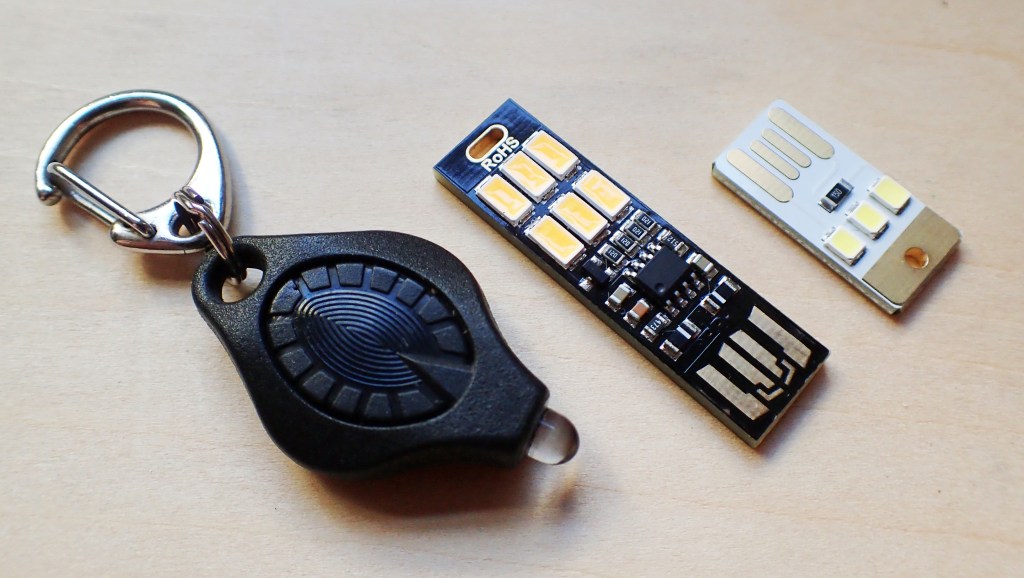 Photon Freedom with two sizes of USB LED light