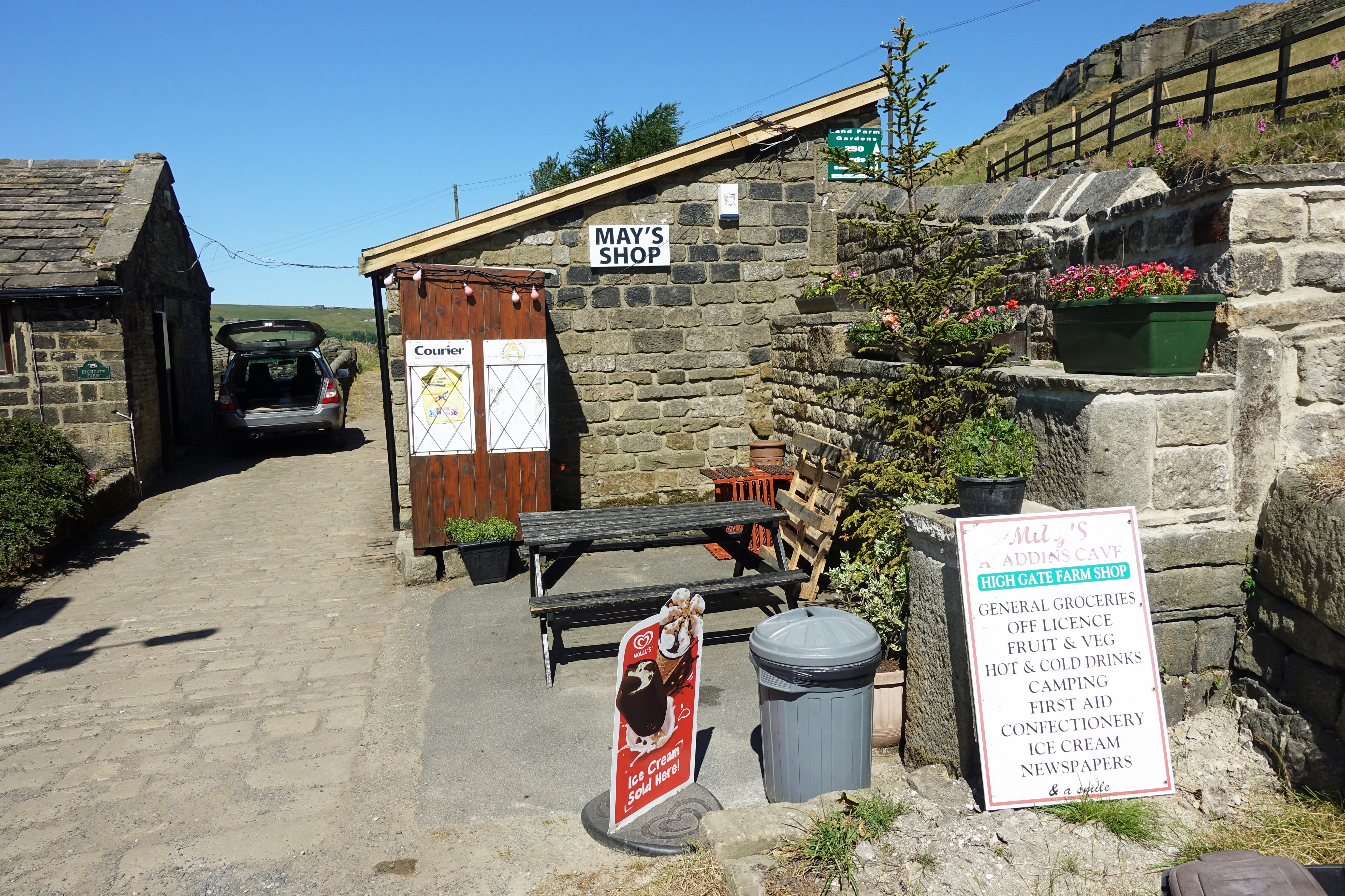 Just a couple of hundred metres off the Pennine Way is May's shop. Some hikers pass. Don't! Call in and put some trade her way