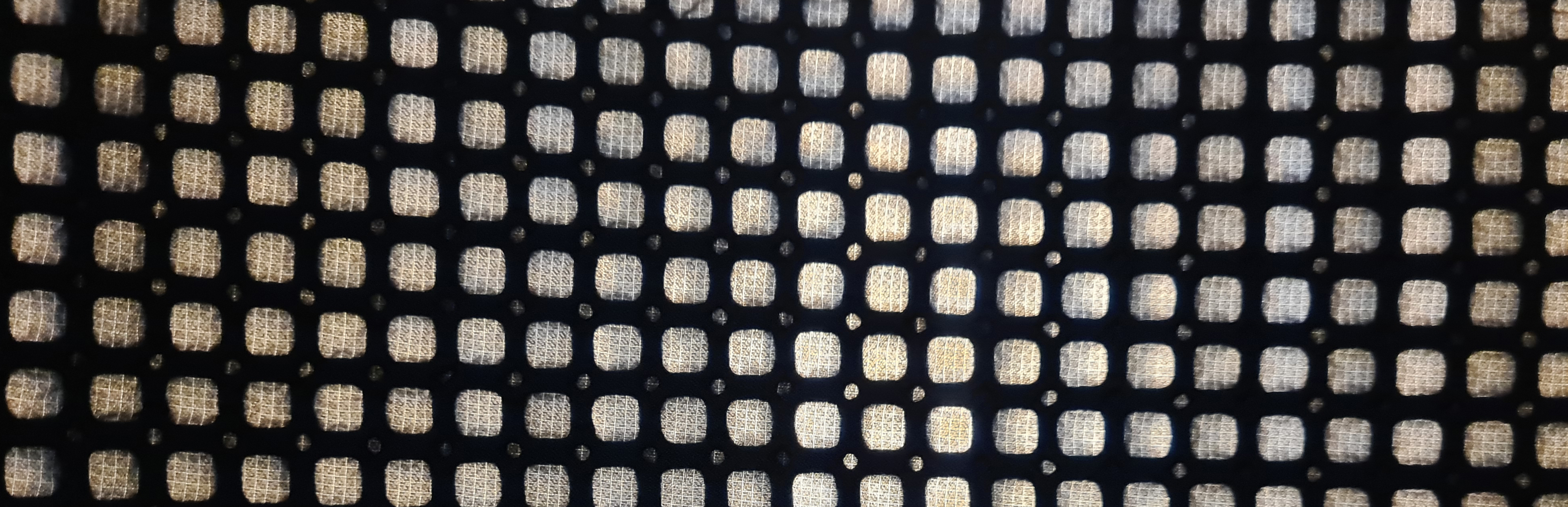 Gossamer Gear Airlight Pad held to the light