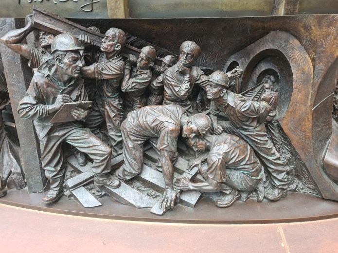 Detail from bronze relief frieze of The Meeting Place