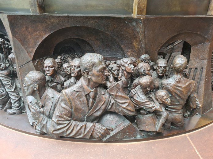 Detail from bronze relief frieze of The Meeting Place