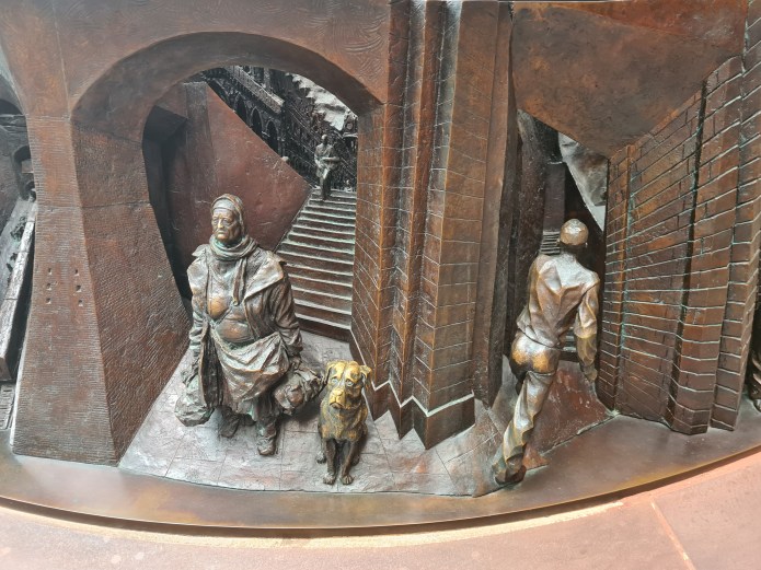 Detail from bronze relief frieze of The Meeting Place