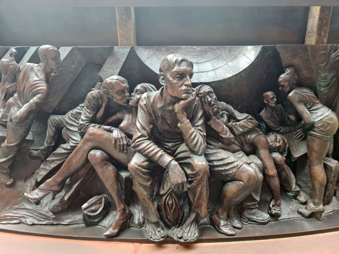 Detail from bronze relief frieze of The Meeting Place