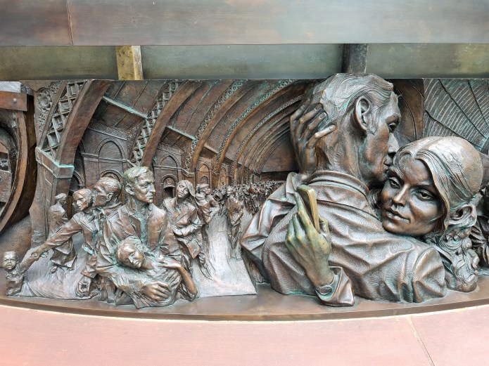 Detail from bronze relief frieze of The Meeting Place