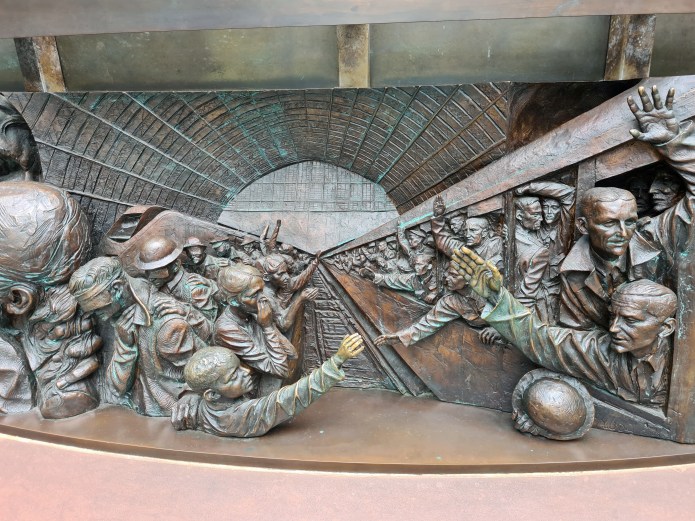 Detail from bronze relief frieze of The Meeting Place