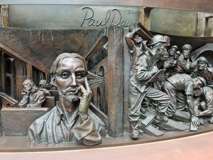 Detail from bronze relief frieze of The Meeting Place