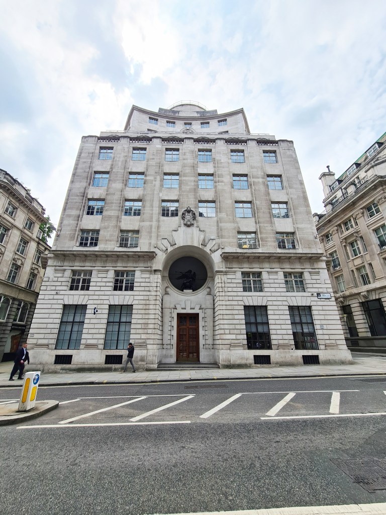 85 Fleet Street, former Reuters Building. Statue of Fame above entrance