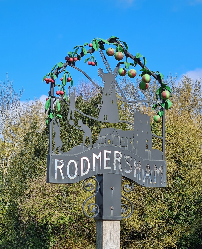 Perforated metal village sign at Rodmersham Green