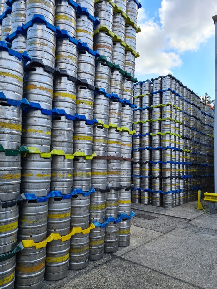 Exiting the brewery town of Faversham the trail passes between fenced yards containing thousands of barrels of beer destined overseas. Someone had levered the bottom of the rails up and attempted to pull out the bottom barrel of a stack- that wasn't going to happen