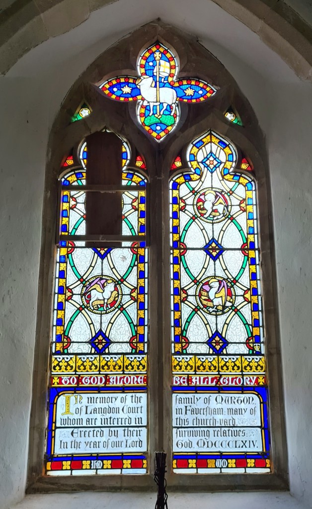 East window contains stained glass of 1864 by Thomas Willement, a memorial to the Murton family