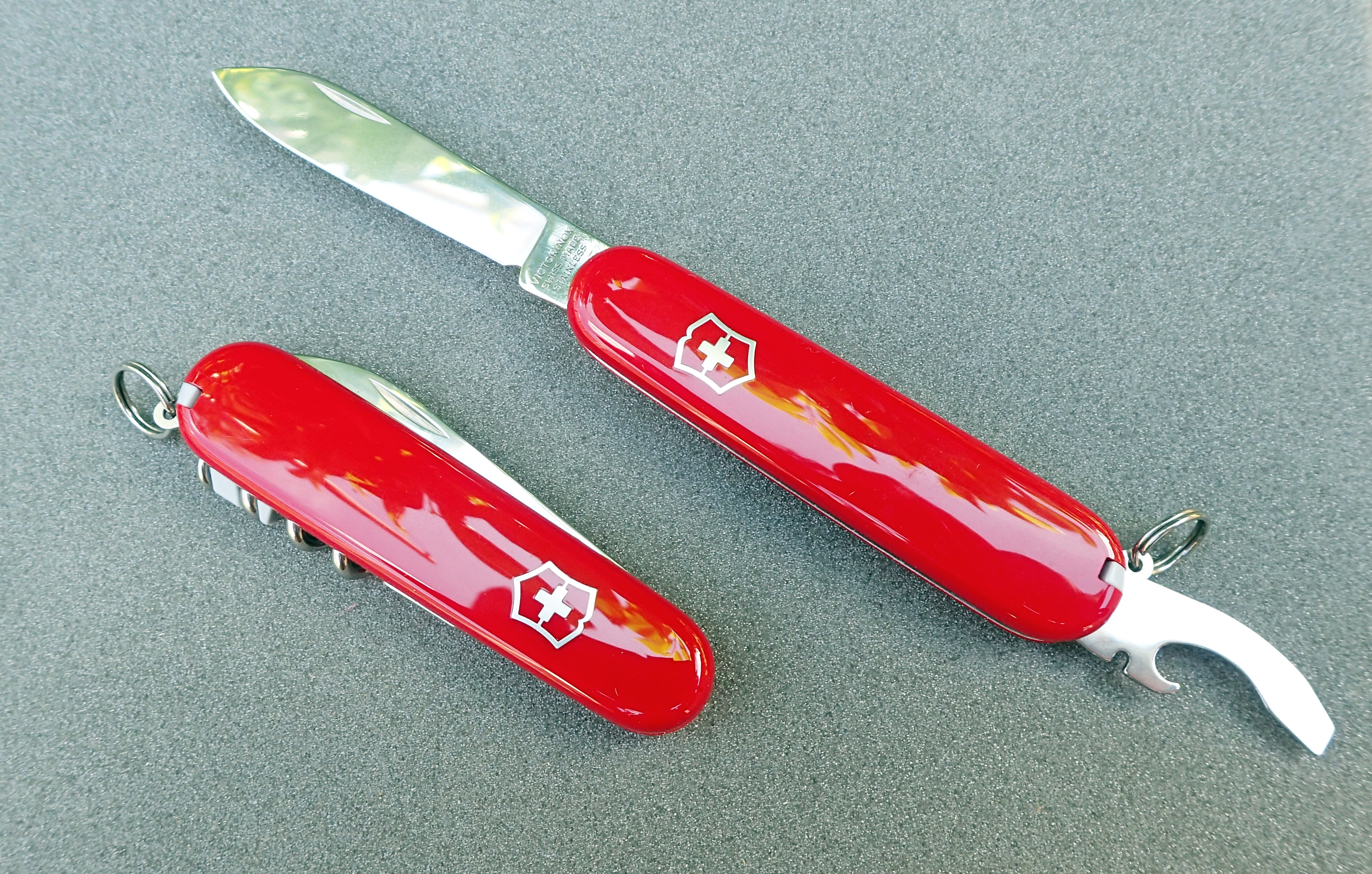 Open 84mm Victorinox Bantam with closed 84mm Victorinox Waiter