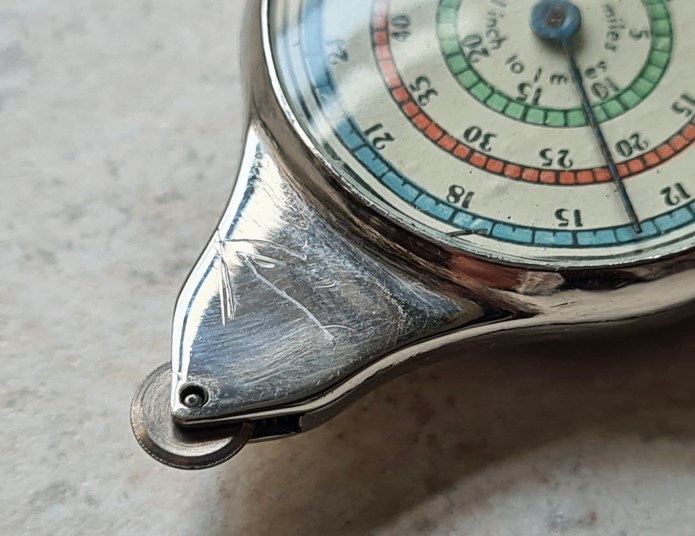 Scratched direction of travel on measure, note finely toothed tracking wheel