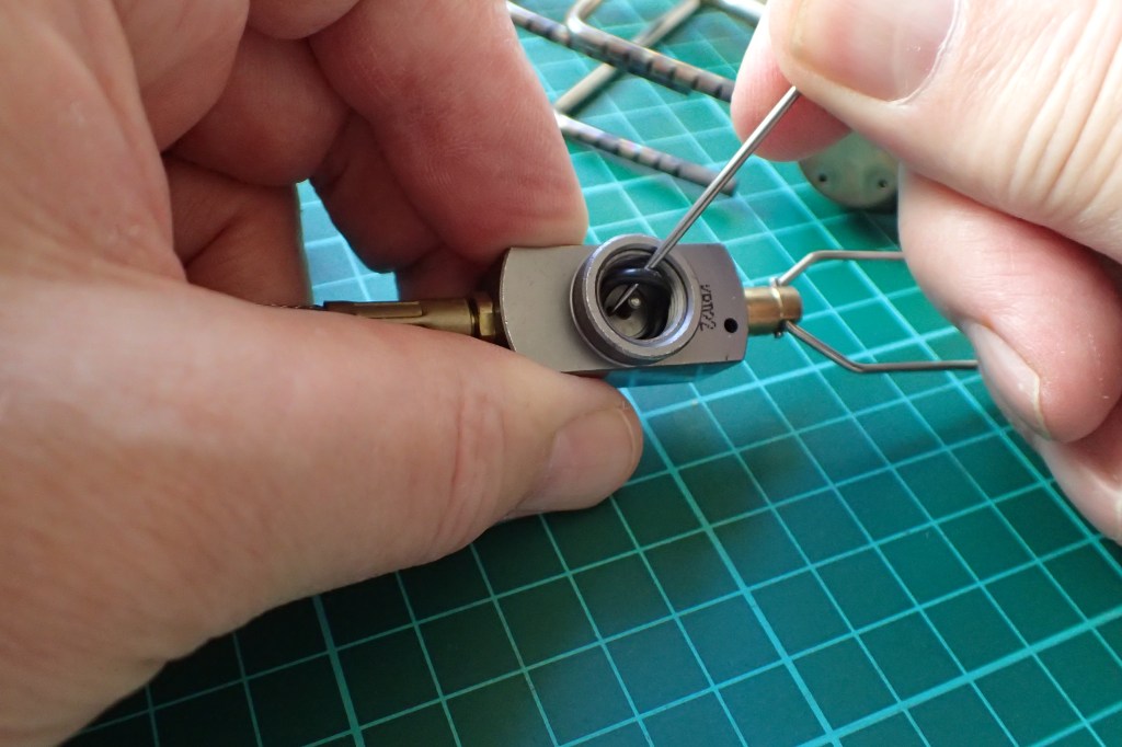 Using titanium pick to carefully remove O-ring from Kovea Spider connector