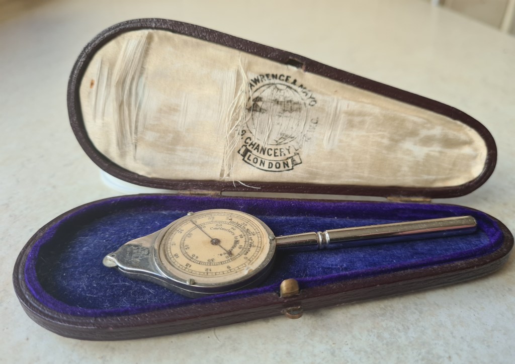 Felt and silk lined case supplied by Lawrence & Mayo. This shows their 67-69 Chancery Lane London address.