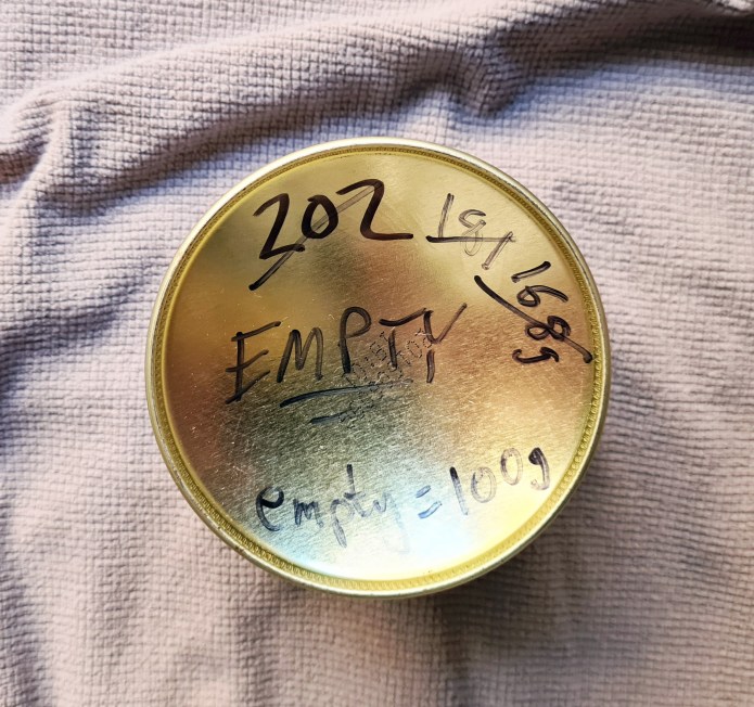 It may be helpful to hold onto emptied canisters as either refereence or as tare canisters when  subsequently working with part filled canisters