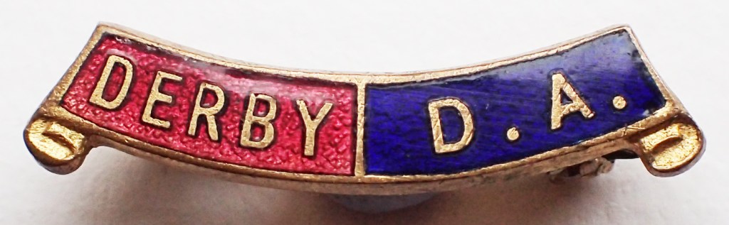 Enamel Derby District Association badge. Pin back. 27mm. No maker's name
