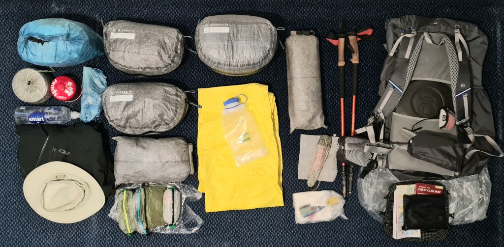 A final check of my gear in my hotel room prior to setting off on the Great Glen Way. Expecting rain, everything is double protected. Expecting cold conditions, I included a set of insulated clothing stuffed into an additional 'Pod' from Hyperlite Mountain Gear. November 2021