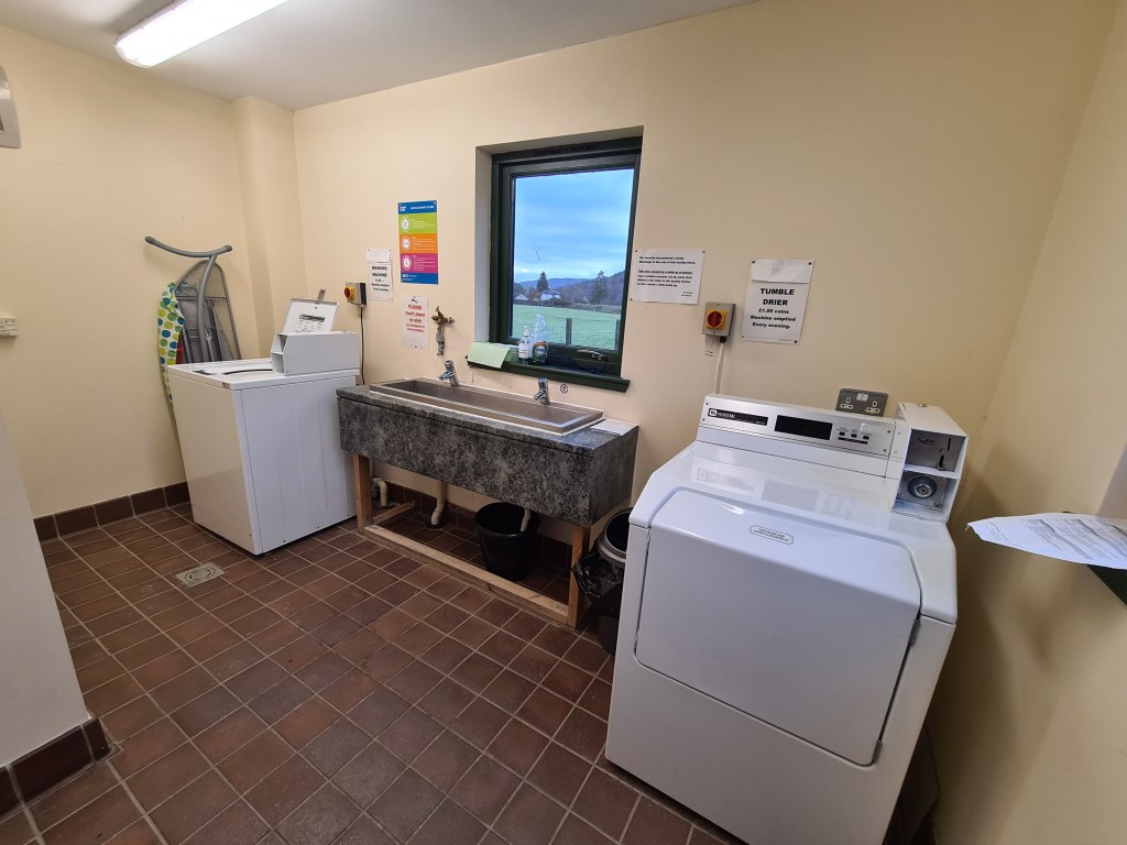 Washing machine and drier (charge), pan wash, potable water, charging facility. Gairlochy