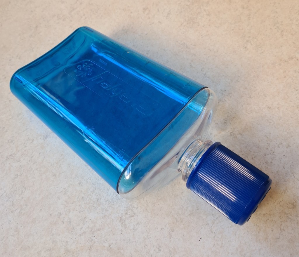 Nalgene flask comes with insulating sleeve and 'shot-glass' cap on lid
