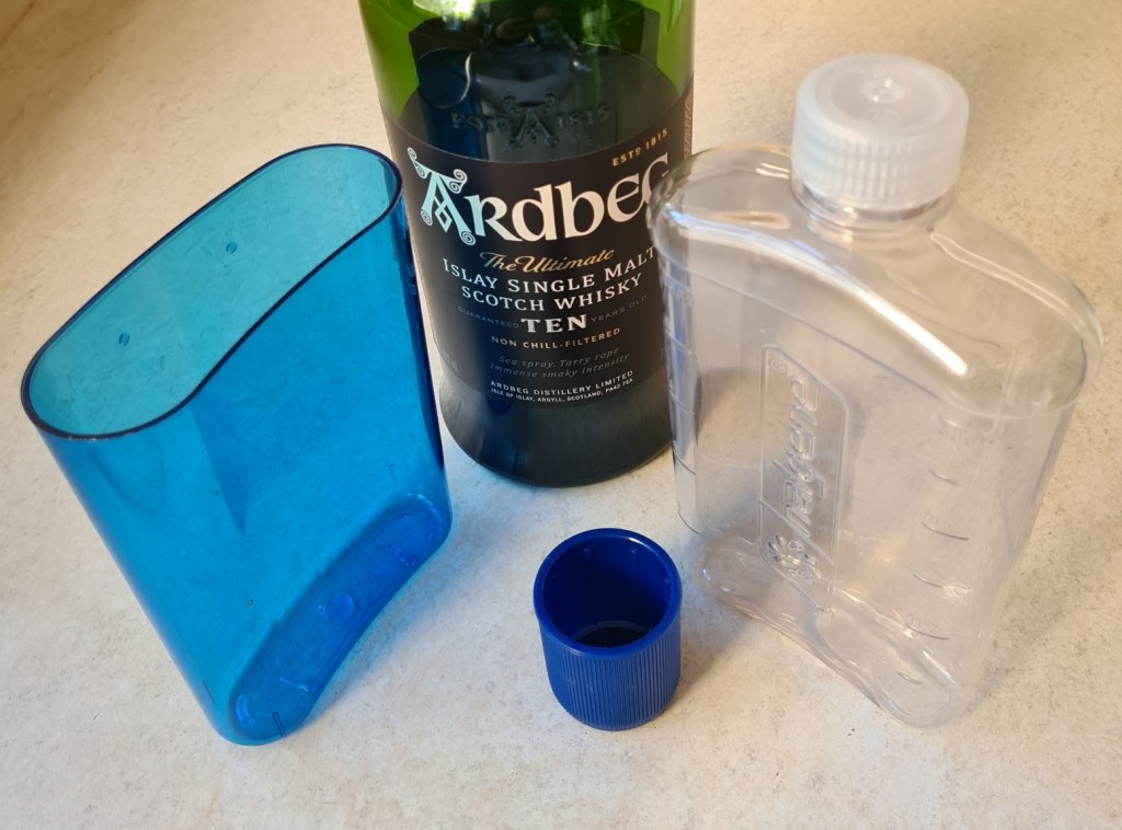 Nalgene flask comes with insulating sleeve and 'shot-glass' cap on lid