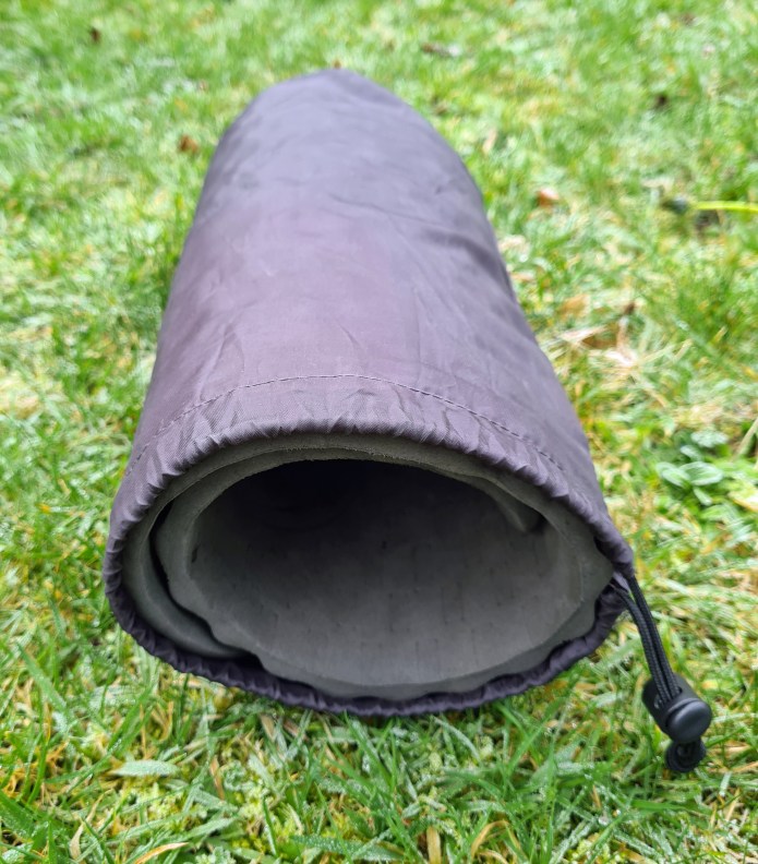 A rolled sitpad from my Gossamer Gear pack rolled inside my inflatable mattress stuffsack gives a little support, but is only comfortable if sleeping on my back