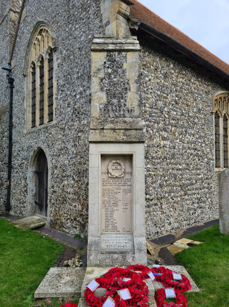 First World War memorial set into diagonal angle-buttress at St. Mary, Nonnington