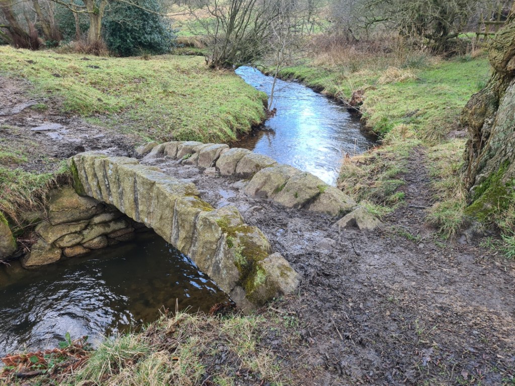 Tiny stone bridge over one of the frequent streams crossed