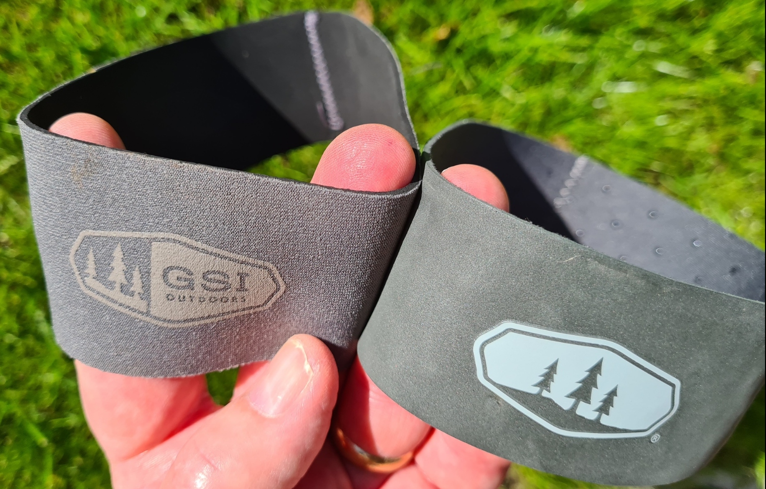 Slip on/off neoprene insulating sleeves. Old style on left and improved current version on right