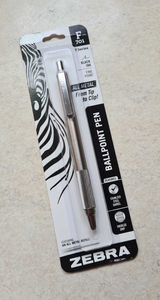 Packaged F-701, "all metal from tip to clip", not!