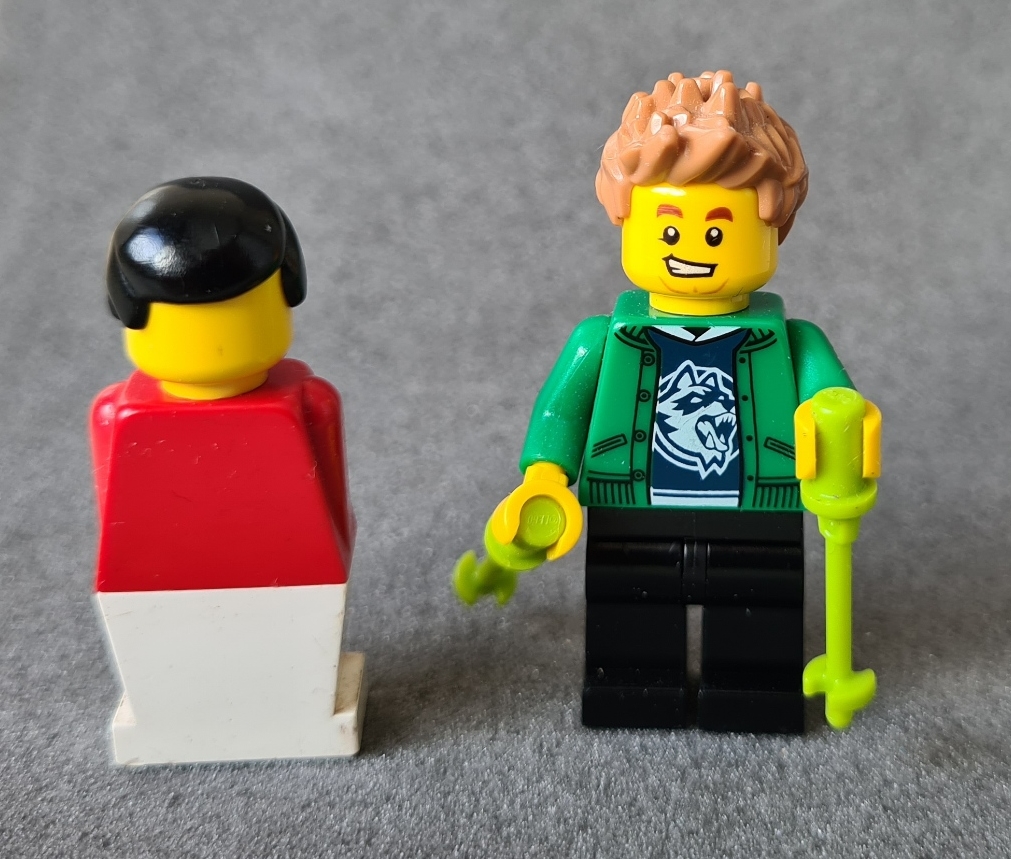 Simple 1976 Lego figure and 2018 Lego Hiker