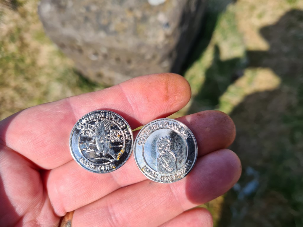 Kists are periodically replenished by volunteers or Southern Upland Way Rangers. Mistakes happen though and it is worth looking through what is inside. This kist held hundreds of both Hoard Otter and Hoard King Duncan tokens