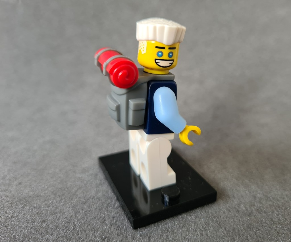 Hiker Zane comes complete with grey backpack with red bedroll on top