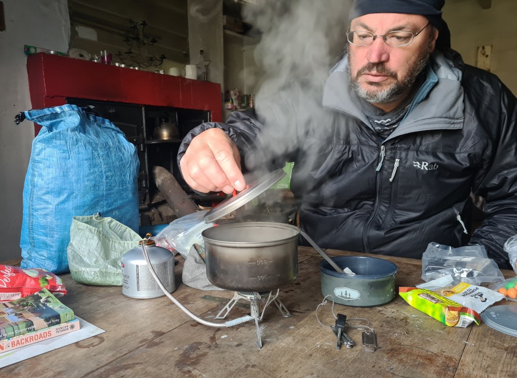 Prepping evening brew at Over Phawhope bothy