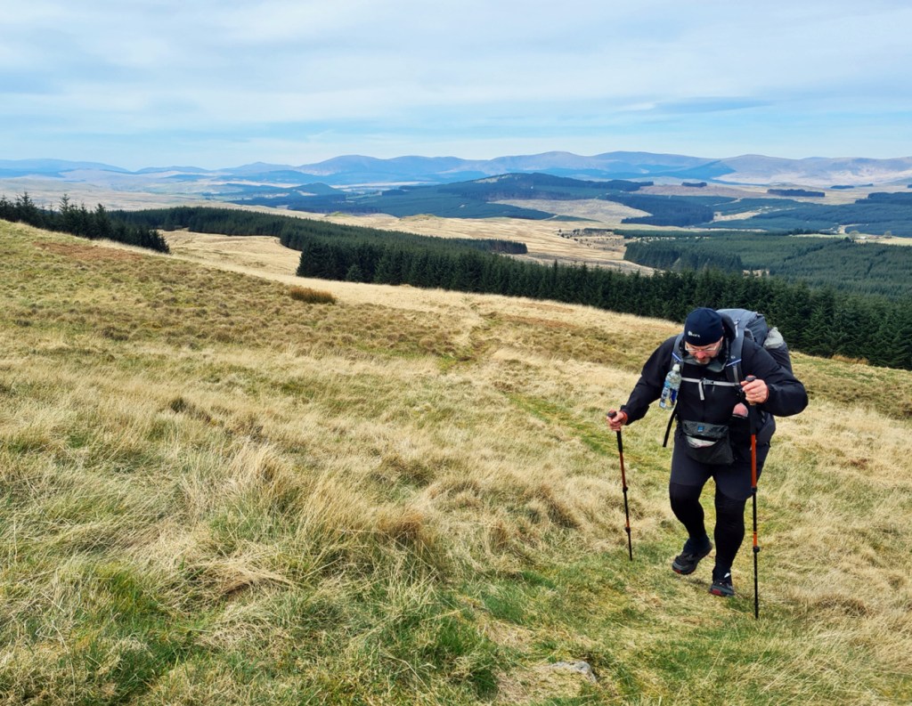 Ascending Benbrack. Glenkens valley behind with Rhinns of Kells range and Carsphairn hills beyond