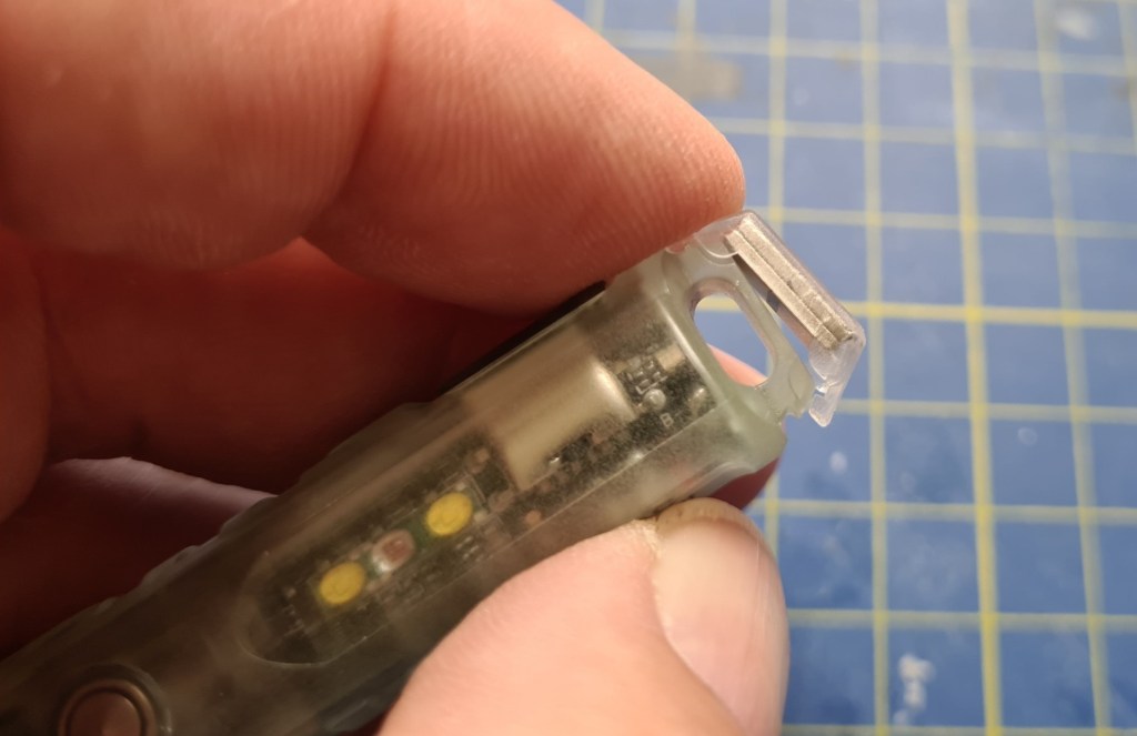 The clip on end magnet has four small corner lugs to keep it oriented and in place