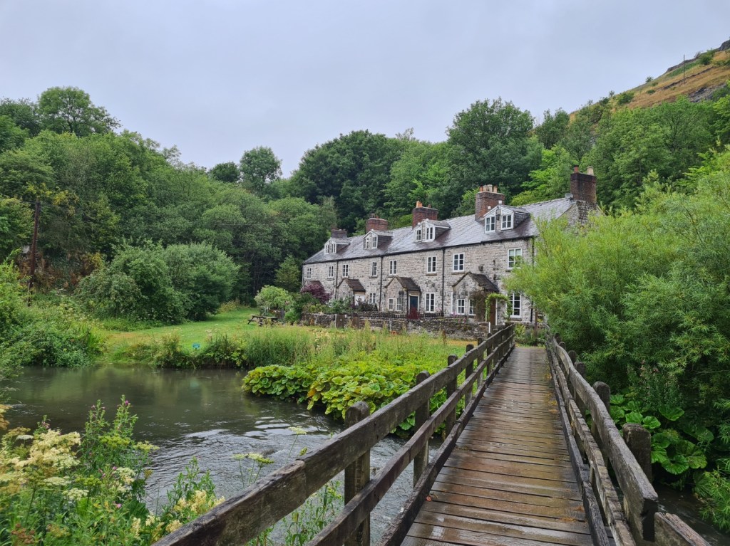 crossing the River Wye in the Wye Dale. My climb out is on the right