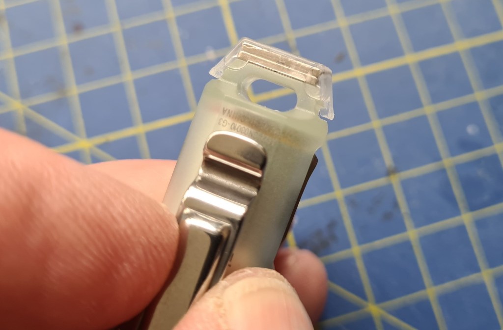 Magnetic end cap fully clipped in to place