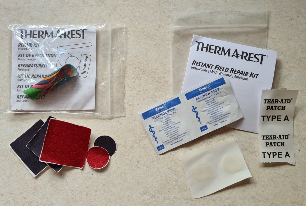 Manufacturers have supplied repair kits for inflatable pads for many years. Most have steadily improved in their ease of use and effectiveness over the years. The latest 'Instant Field Repair Kit' from Thermarest is shown on the right here- containing two alcohol prep wipes, two Glue Dots and two adhesive patches (Type A)