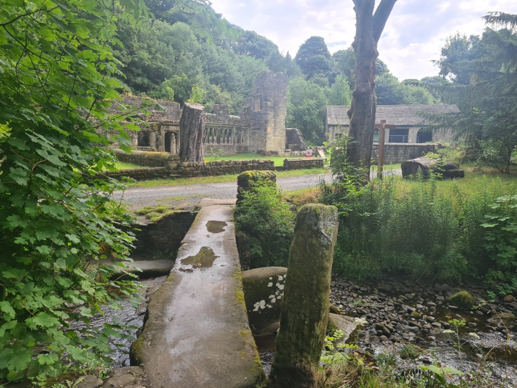 Simple clapper bridge and Wycoller Hall, latter dating from the 16th century the rot had set in 300 years later. It was the inspiration for Charlotte Bronte's Ferndean Manor in her novel- Jane Eyre