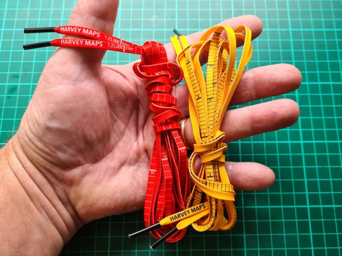 map-measure-go laces, in the hand