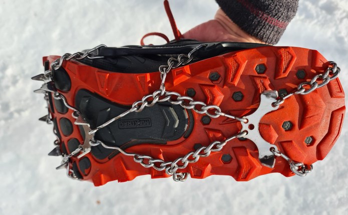 Microspikes over heel