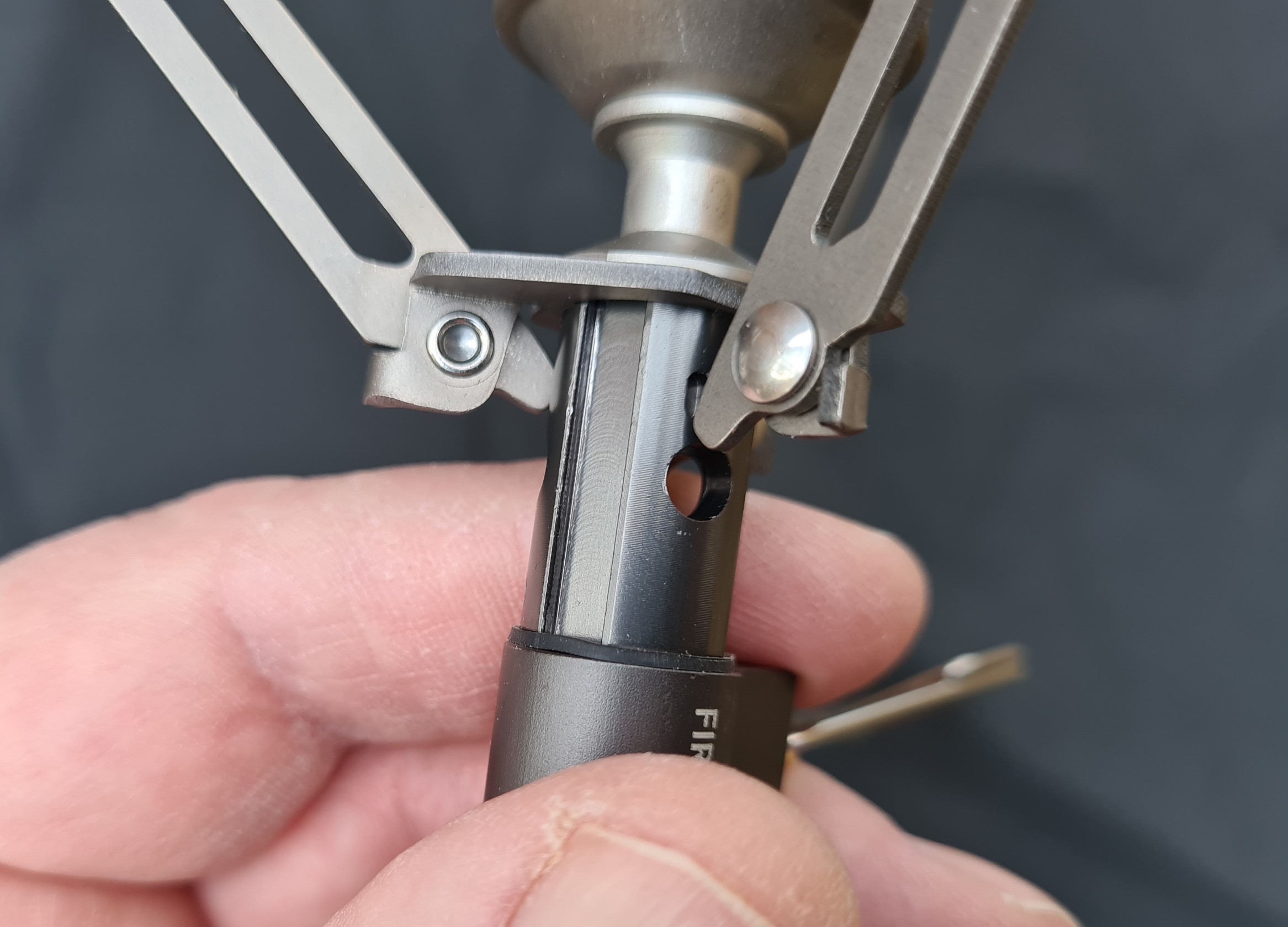 There are three indents in the stove stem in to which the opened pot supports sit