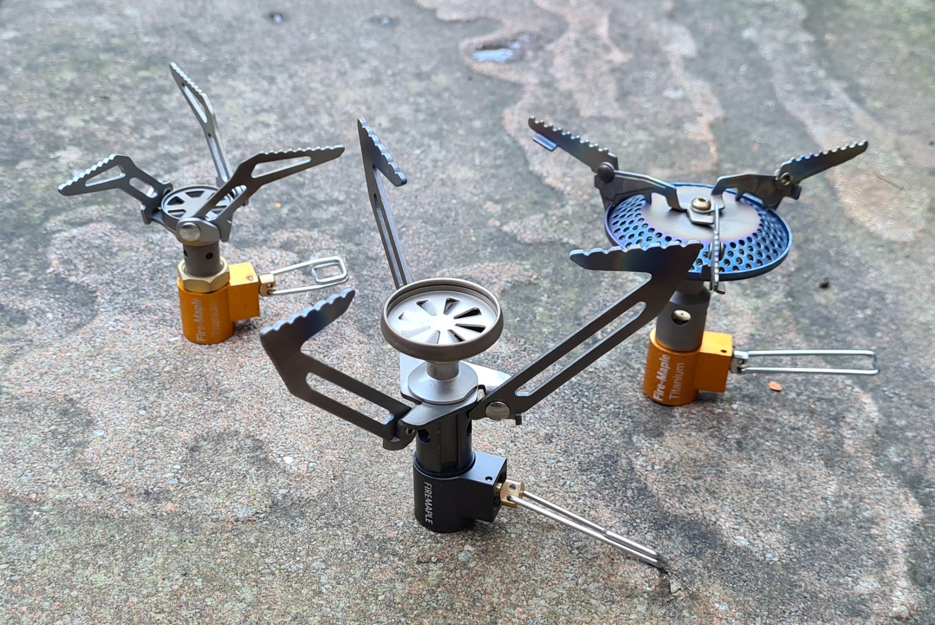 Three Fire Maple stoves, from left- Hornet 300T, Hornet II, FMS-116T