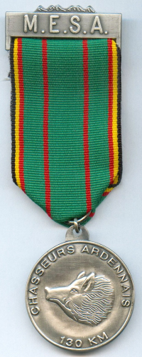 Medal for 130km Marche du Souvenir et de L'Amitie. Obverse. M.E.S.A. on top bar.