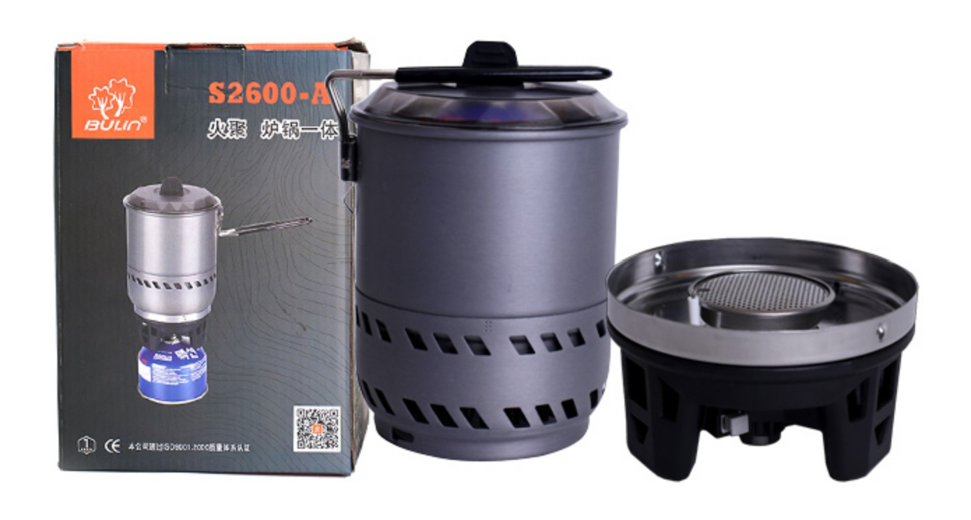 The discontinued 540g Bulin S2600-A had an interesting design of heat exchanger with both air inlet for the stove and a high outlet for hot gases with the heat exchanger wrapped around the base of the pot