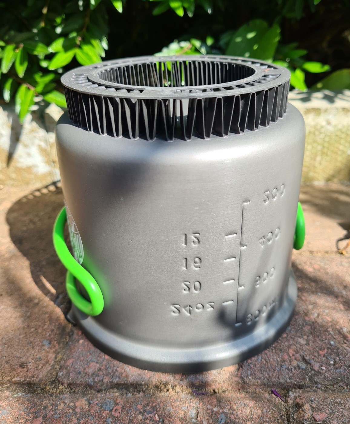 Optimus 207g Heat Exchanger pot. This 950ml hard-anodised aluminium pot with non-stick lining is included in the 284g Terra Weekend HE pot set. A 375g 'system' when the optional Crux stove is included. Note that the outside of the fins are exposed and therefore more affected by wind