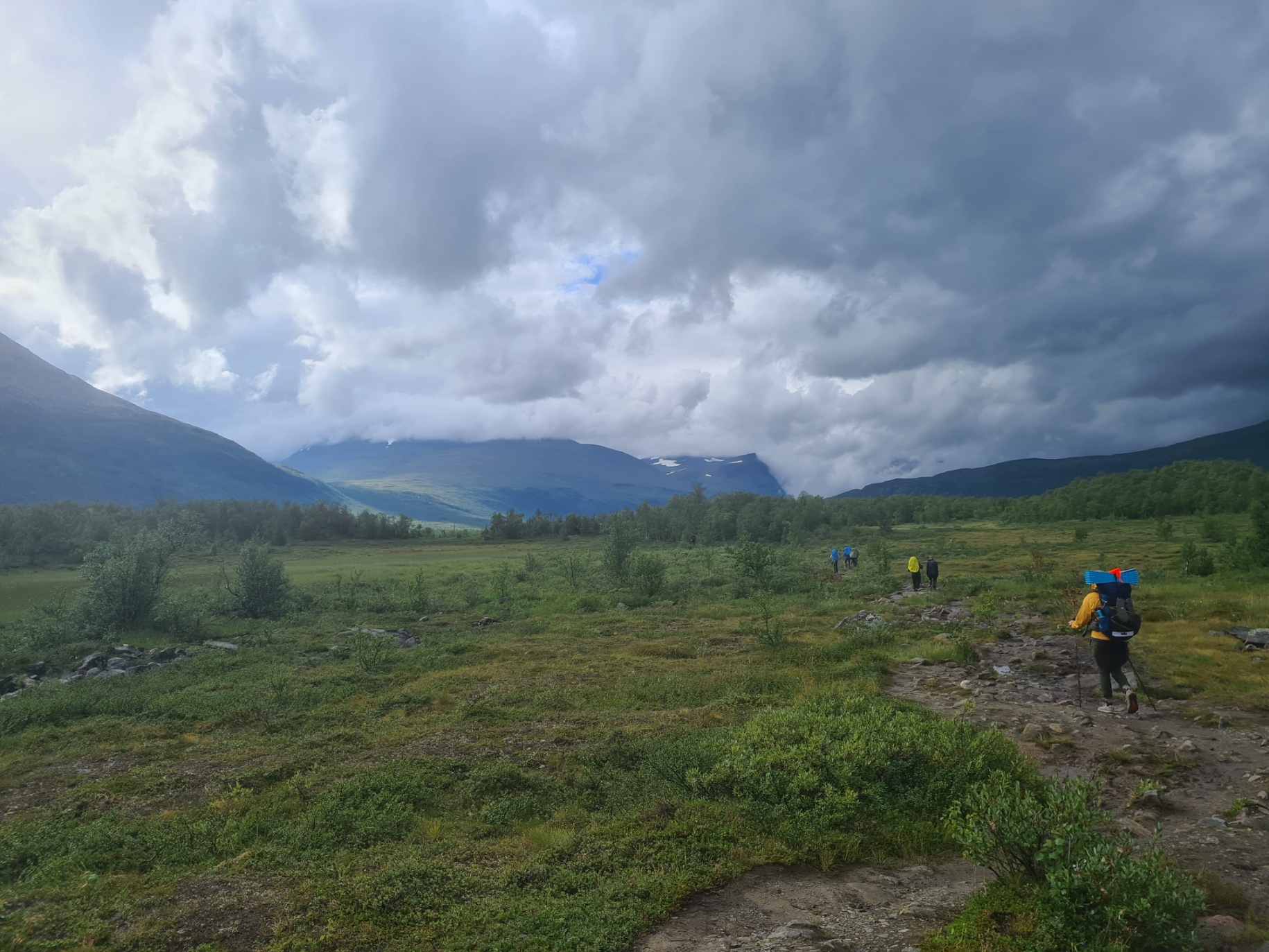 The trail opens up and trees are left behind
