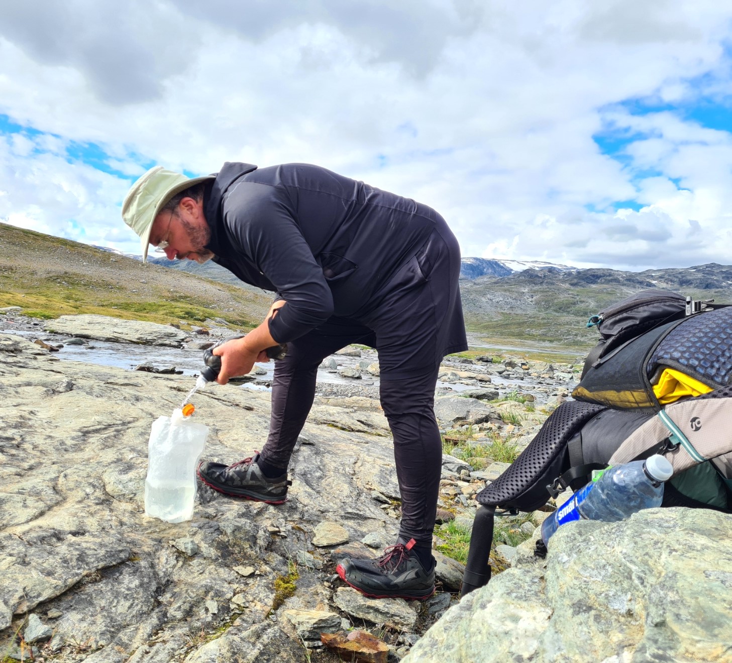 Filtering water at one of the many little streams crossed