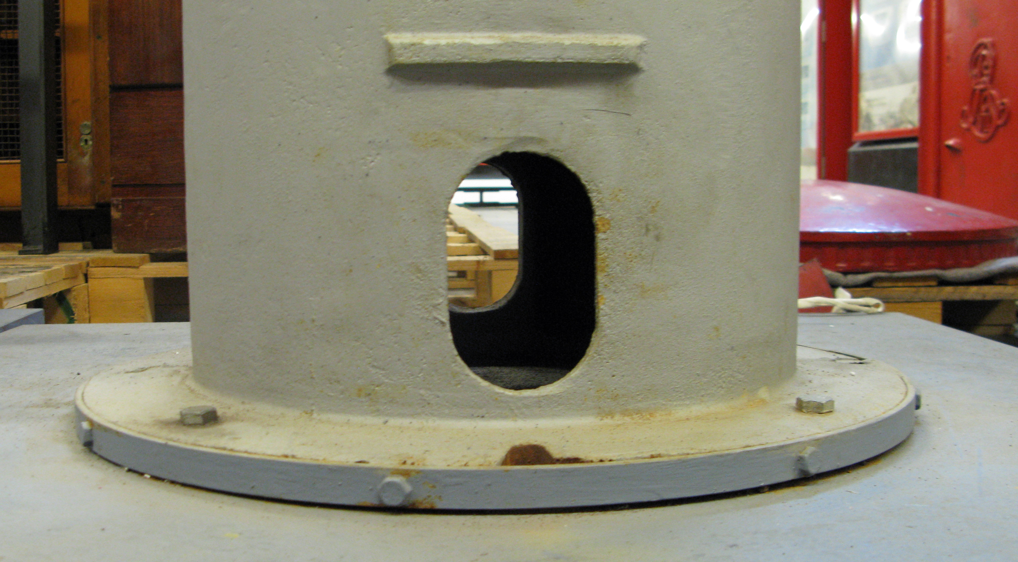 Depth marker and base flange on unpainted Nigerian box in Postal Museum collection